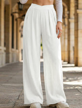 Cross-pleated high-waisted loose-fitting trousers