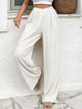 Cross-pleated high-waisted loose-fitting trousers