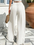 Cross-pleated high-waisted loose-fitting trousers