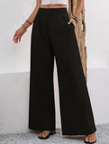 Stylish high-waisted wide-leg trousers for commuting