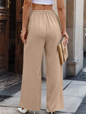 Women's high-waisted straight-leg suit pants with irregular patchwork design