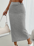 High-waisted fitted skirt with side slits