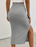 High-waisted fitted skirt with side slits