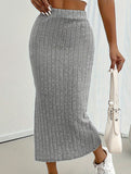 High-waisted fitted skirt with side slits