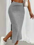 High-waisted fitted skirt with side slits