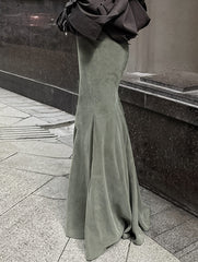 waist-hugging floor-length skirt