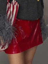 Spicy red patent leather mini skirt