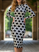 Hip-hugging polka-dot dress with back slits