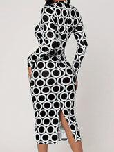 Hip-hugging polka-dot dress with back slits