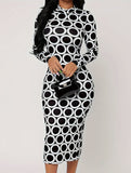 Hip-hugging polka-dot dress with back slits