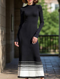 Pleated black and white striped sweater dress