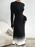 Pleated black and white striped sweater dress