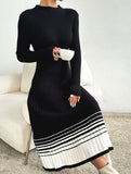 Pleated black and white striped sweater dress