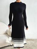 Pleated black and white striped sweater dress