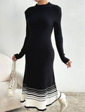 Pleated black and white striped sweater dress
