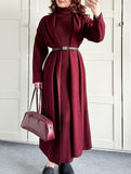 Slim-fitting turtleneck dress and cardigan set