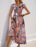 Resort-style midi dress with paisley floral print