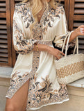 Printed V-neck three-quarter sleeve tie-waist dress