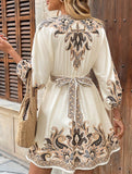 Printed V-neck three-quarter sleeve tie-waist dress