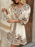 Printed V-neck three-quarter sleeve tie-waist dress