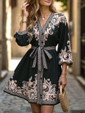 Printed V-neck three-quarter sleeve tie-waist dress