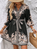 Printed V-neck three-quarter sleeve tie-waist dress