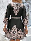 Printed V-neck three-quarter sleeve tie-waist dress