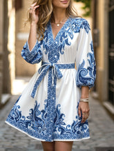 Printed V-neck three-quarter sleeve tie-waist dress