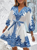 Printed V-neck three-quarter sleeve tie-waist dress