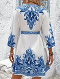 Printed V-neck three-quarter sleeve tie-waist dress