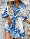 Printed V-neck three-quarter sleeve tie-waist dress