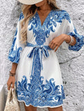 Printed V-neck three-quarter sleeve tie-waist dress