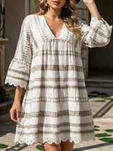 New summer dress with lace trim and cuffs