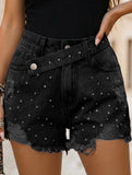 Women's washed distressed studded denim shorts