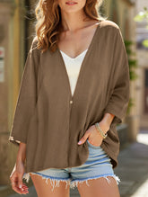 V-neck loose mid-length sleeve cardigan