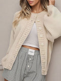 Crew neck single-breasted knitted cardigan