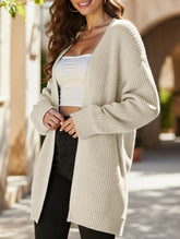 Loose mid-length V-neck solid color sweater