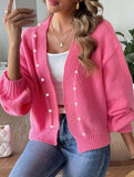 Women's pink button-down knit cardigan