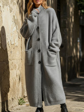 Oversized mid-length knitted cardigan