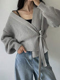 V-neck fitted waist belted knit cardigan