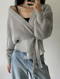 V-neck fitted waist belted knit cardigan