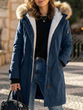Long hooded women's coat with fur collar
