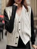 Knit vest with crisscross pattern