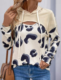 Leopard print paneled hollow hooded sweatshirt