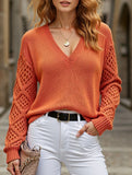 Loose V-neck hollow knit sweater