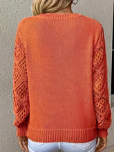Loose V-neck hollow knit sweater