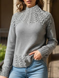 Solid color cable knit sweater