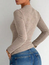 Irregular openwork metal button knit sweater