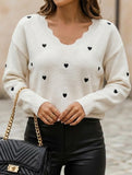 Heart-patterned jacquard V-neck ruffled knit sweater