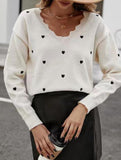 Heart-patterned jacquard V-neck ruffled knit sweater